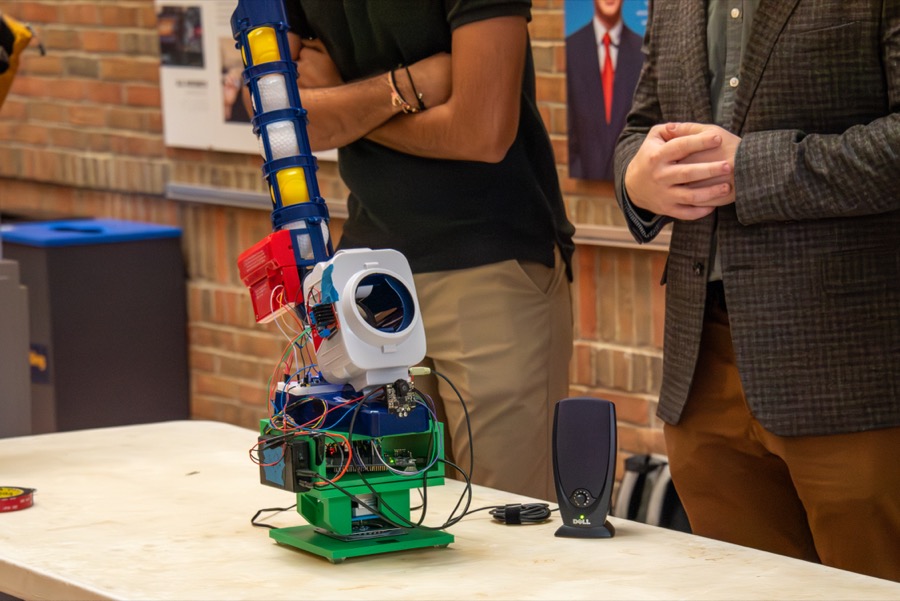 Teams demonstrating their projects at the EECS 373 Embedded System Expo, photo 1