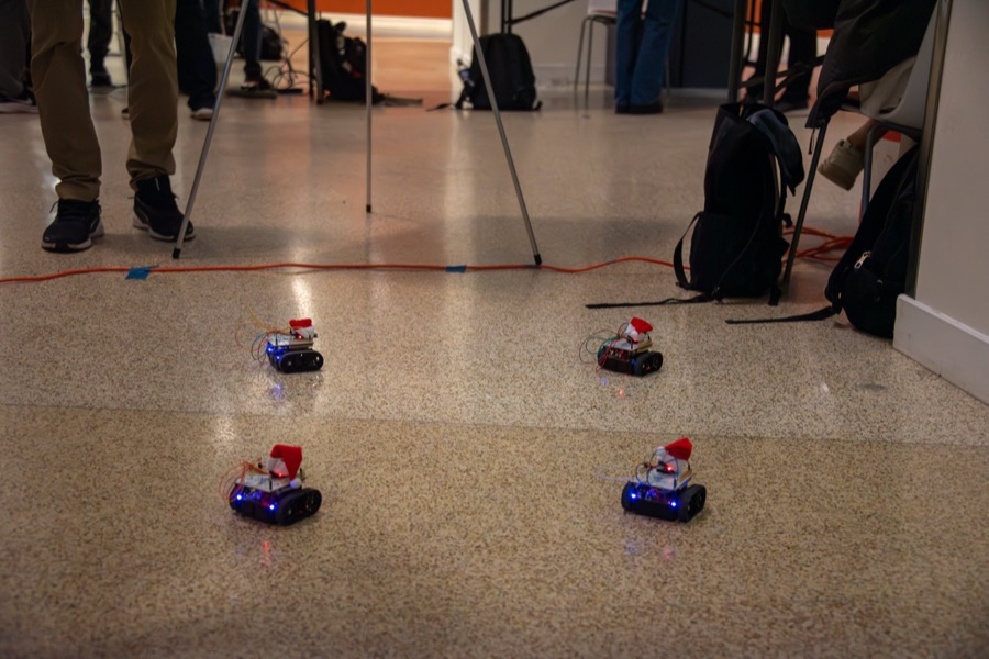 Teams demonstrating their projects at the EECS 373 Embedded System Expo, photo 8