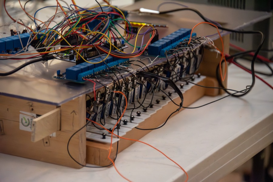 Teams demonstrating their projects at the EECS 373 Embedded System Expo, photo 11