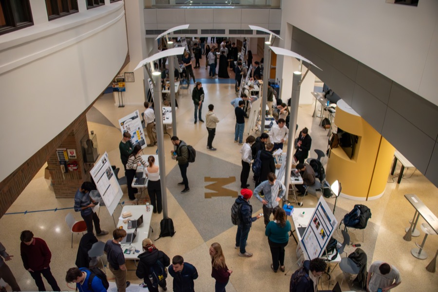 Teams demonstrating their projects at the EECS 373 Embedded System Expo, photo 12