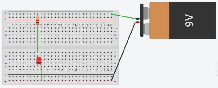 Breadboard with LED, resistor, and battery