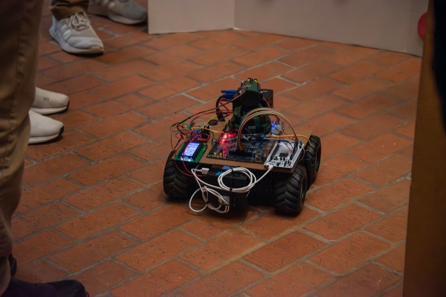 Teams demonstrating their projects at the EECS 373 Embedded System Expo, photo 3
